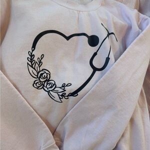 Pink sweater with Stethoscope and Floral Design